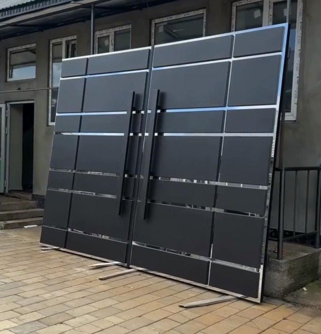 Fabricated grey metal gate leaves finished in the workshop