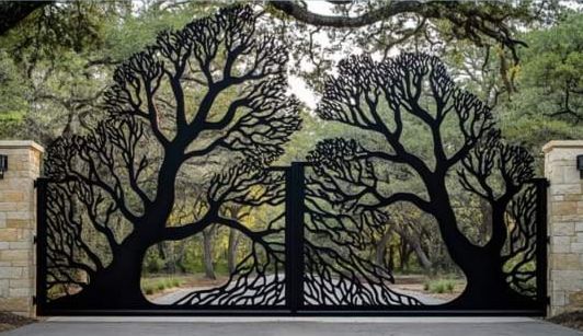 Laser-cut driveway gate with a full tree scene cut through the panels